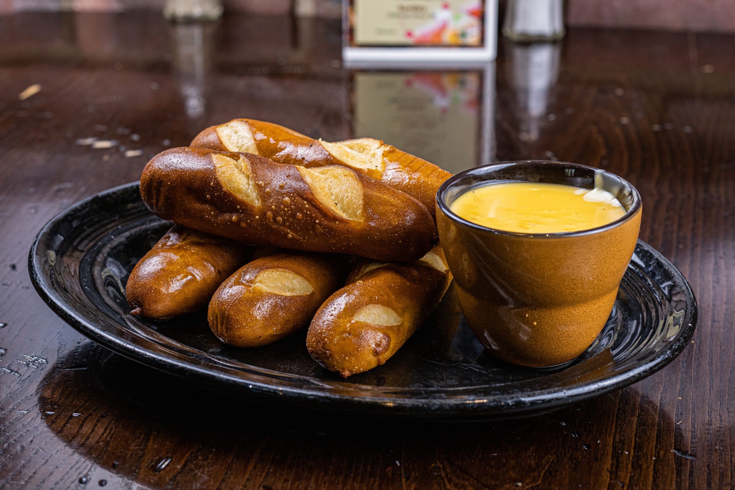 Brick Oven Baked Pretzels with house-made cheese sauce